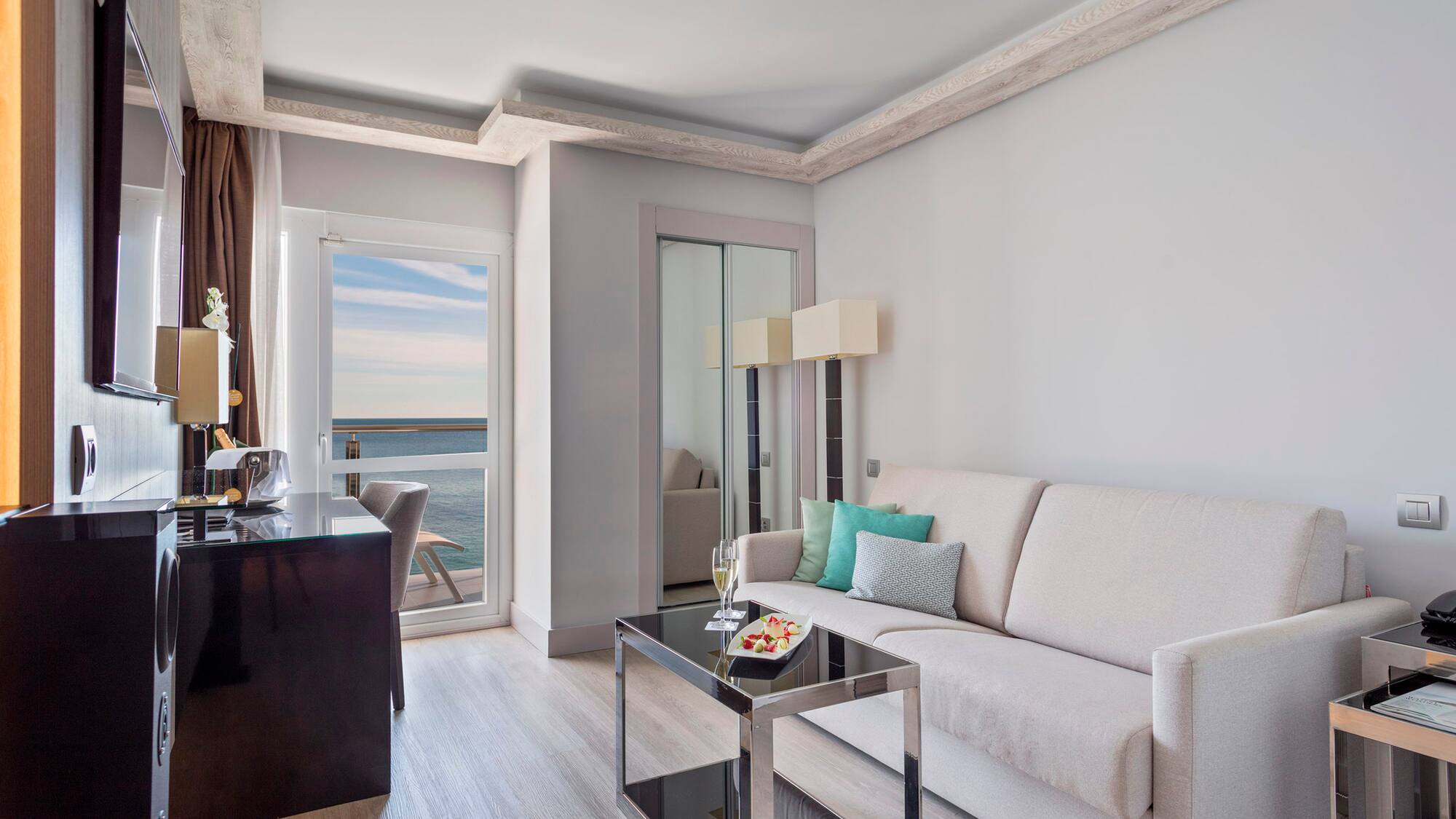 a living room with a couch and a table