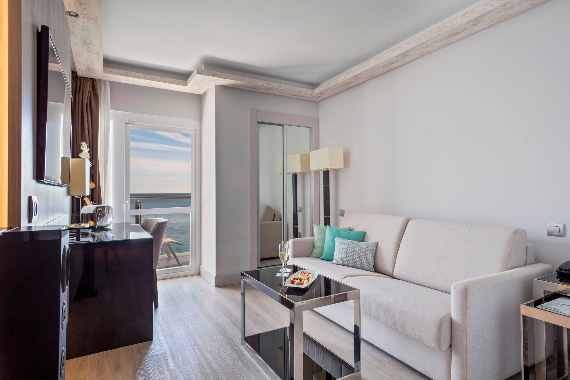 a living room with a couch and a table