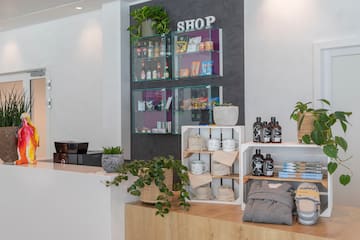 a store with shelves of products and plants
