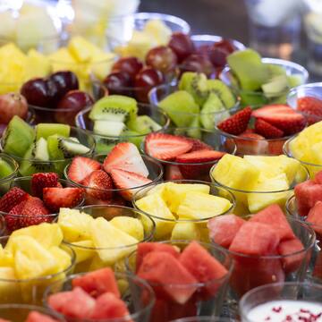 a group of glasses of fruit