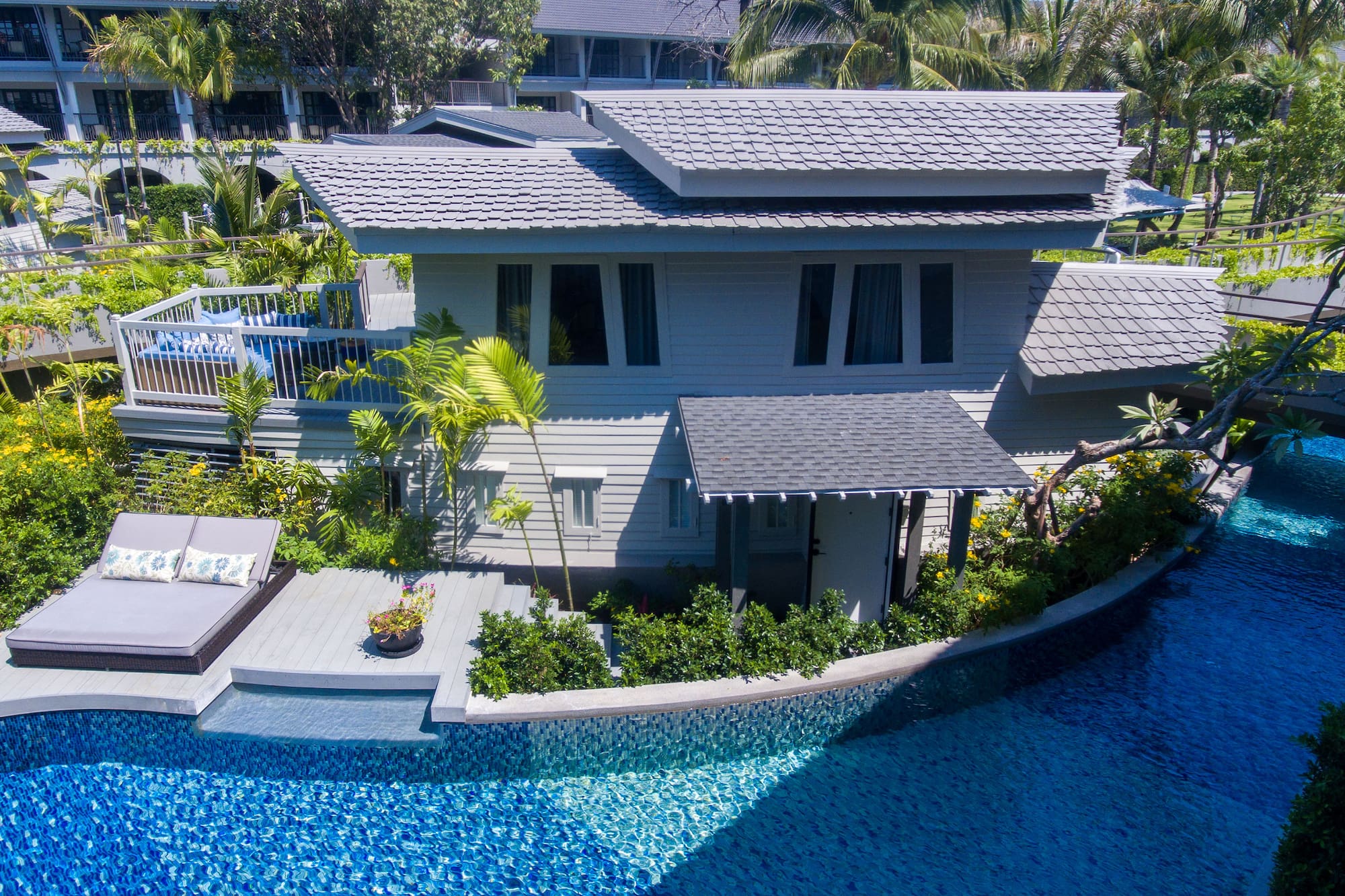 a house with a pool in the background