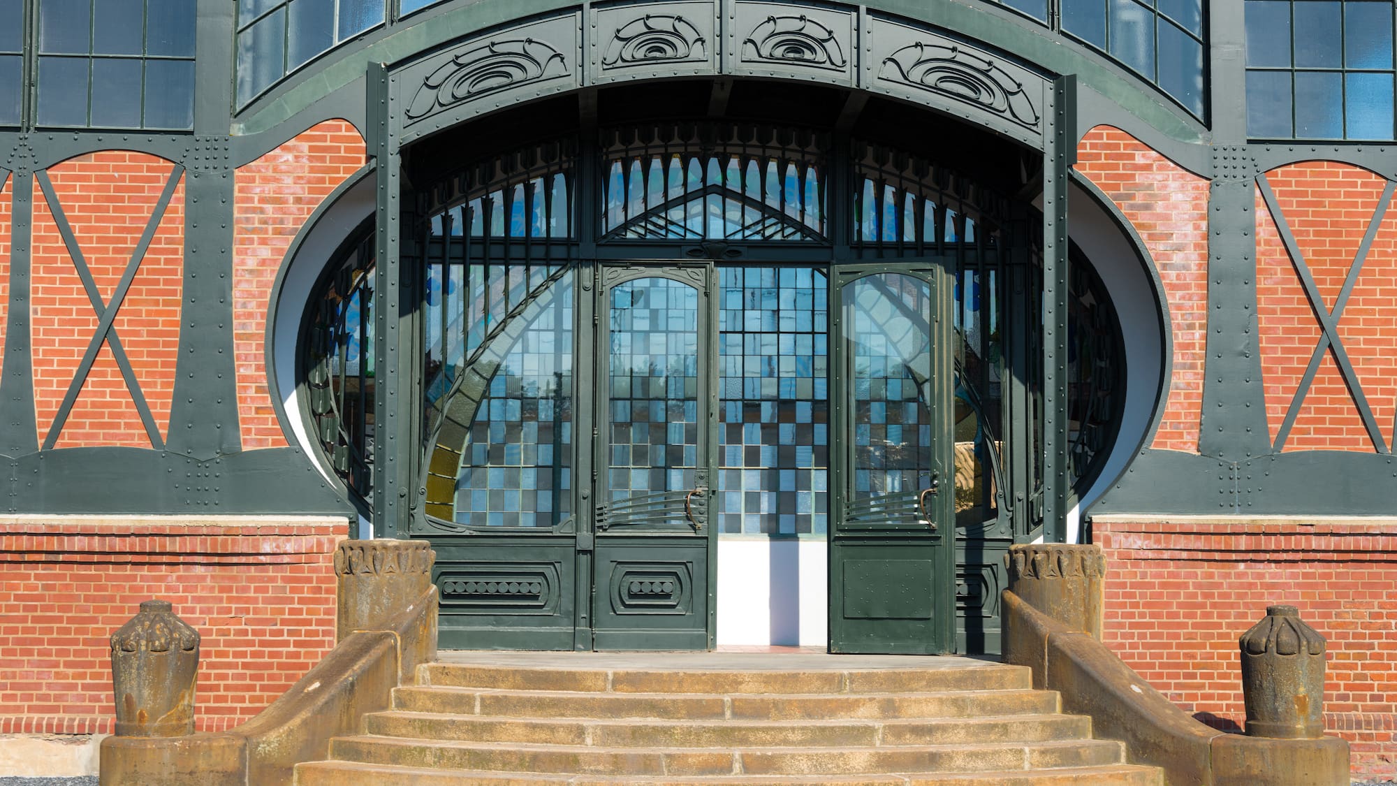 a building with a door and stairs