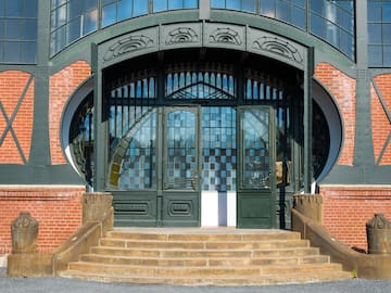 a building with a door and stairs