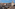 Berlin Spree River, tour boats, TV Tower, and diverse city architecture.