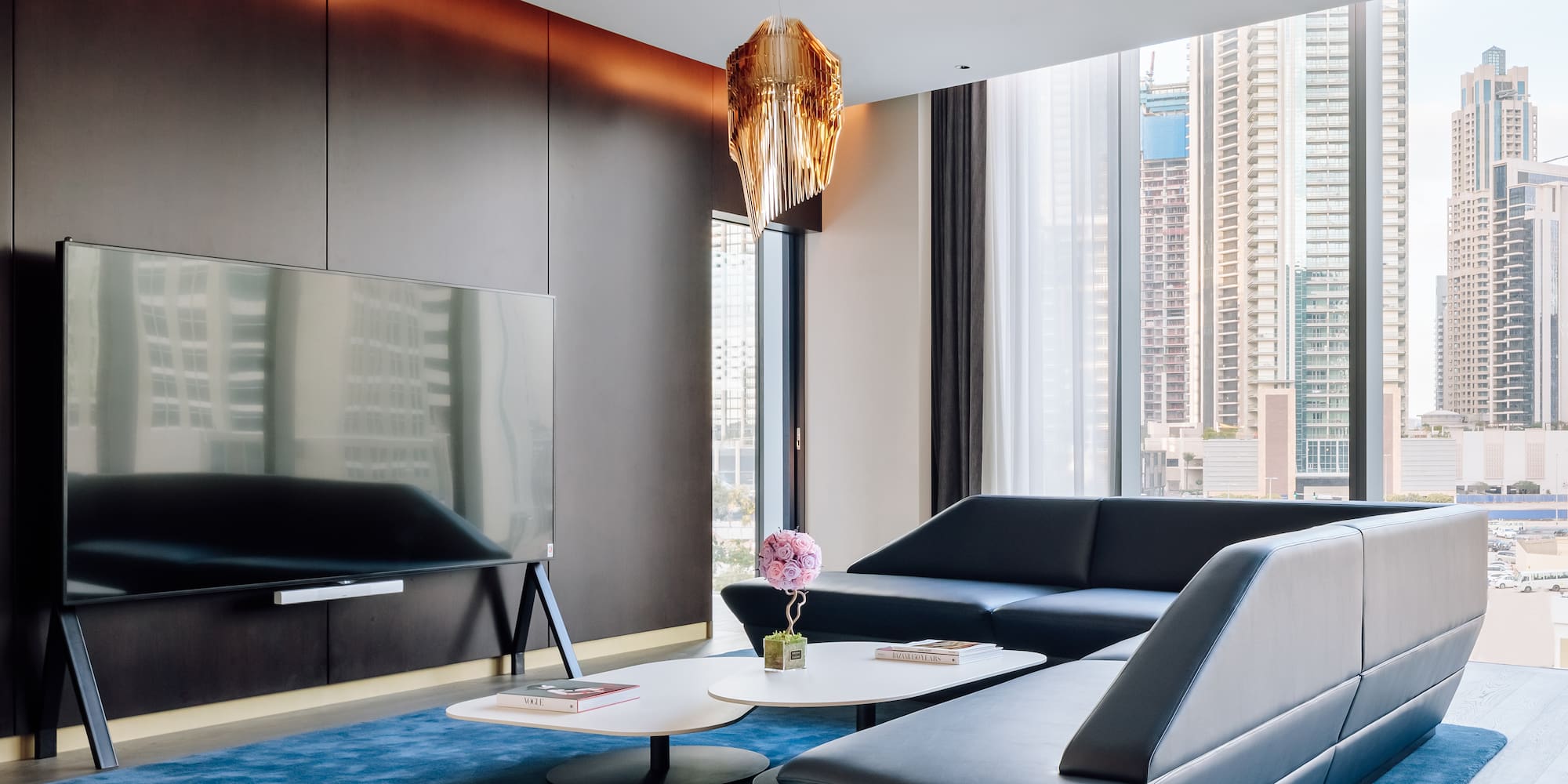 a living room with a couch and a tv