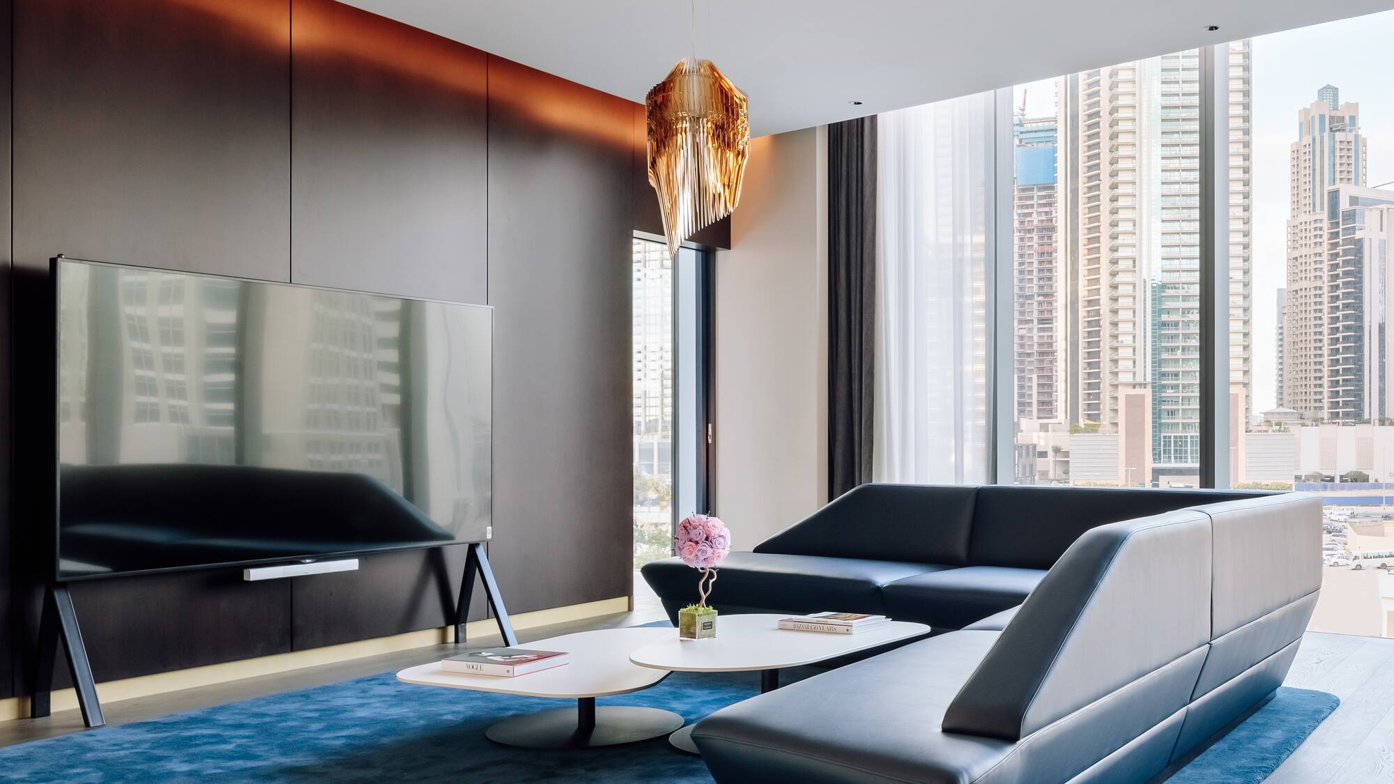 a living room with a couch and a tv