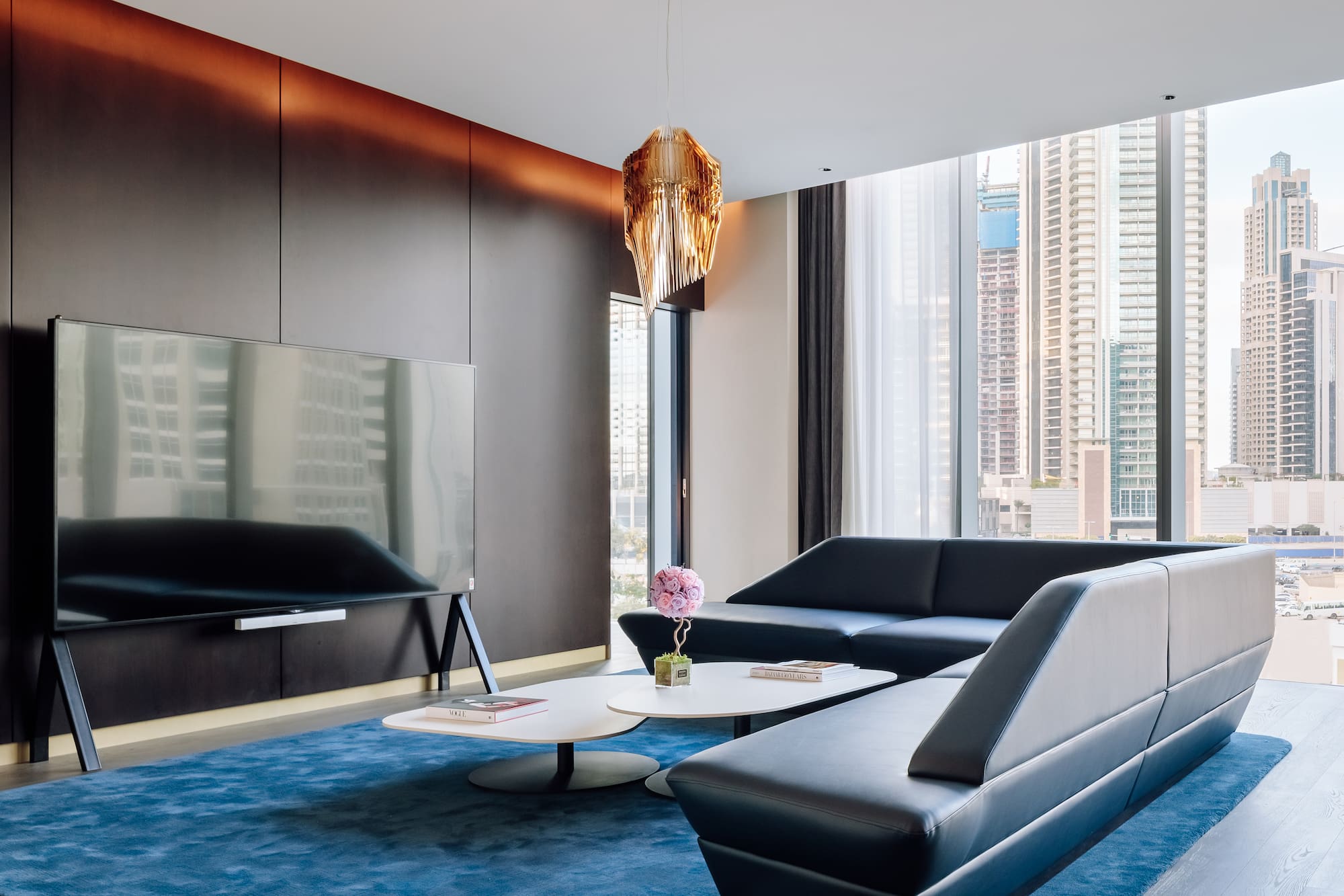 a living room with a couch and a tv