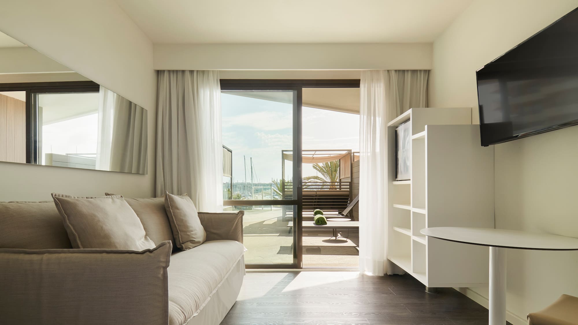 a living room with a couch and a television