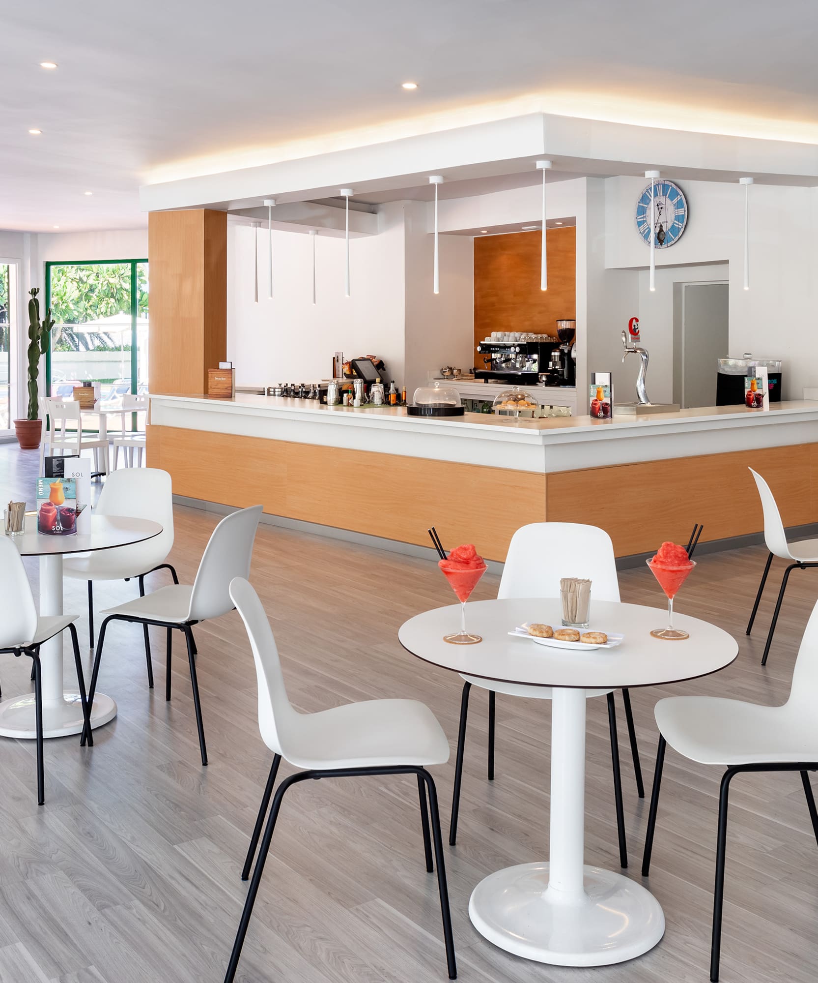 a room with tables and chairs