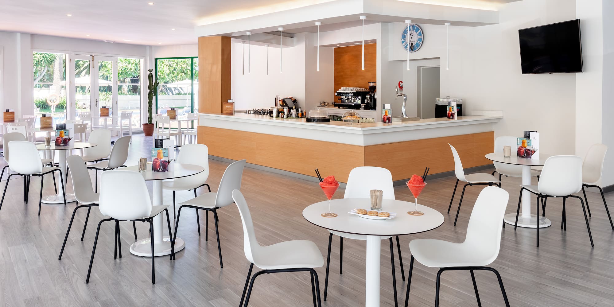 a room with tables and chairs