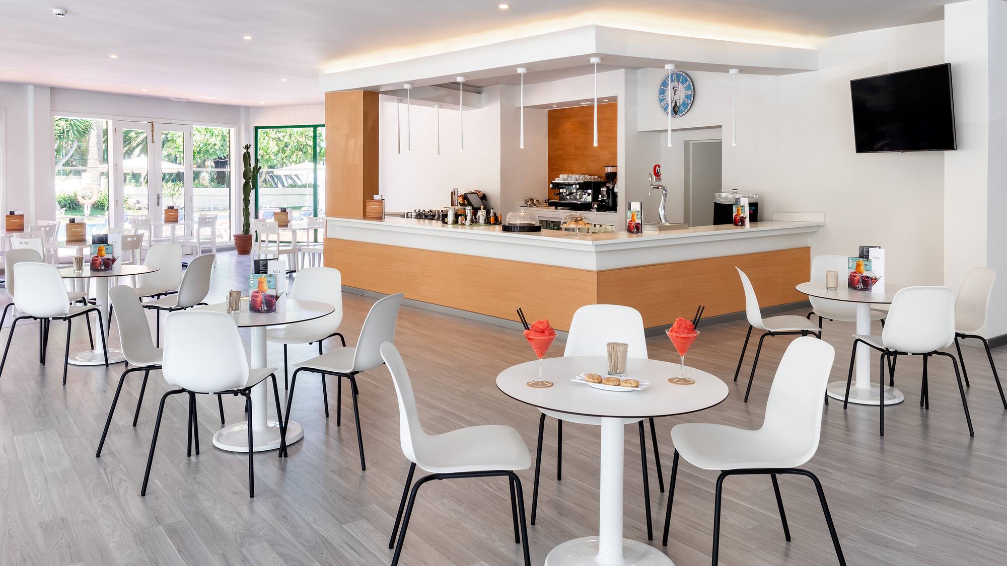 a room with tables and chairs