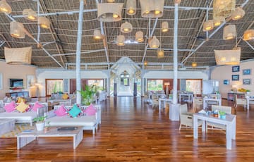 a room with tables and chairs