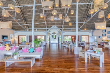 a room with tables and chairs