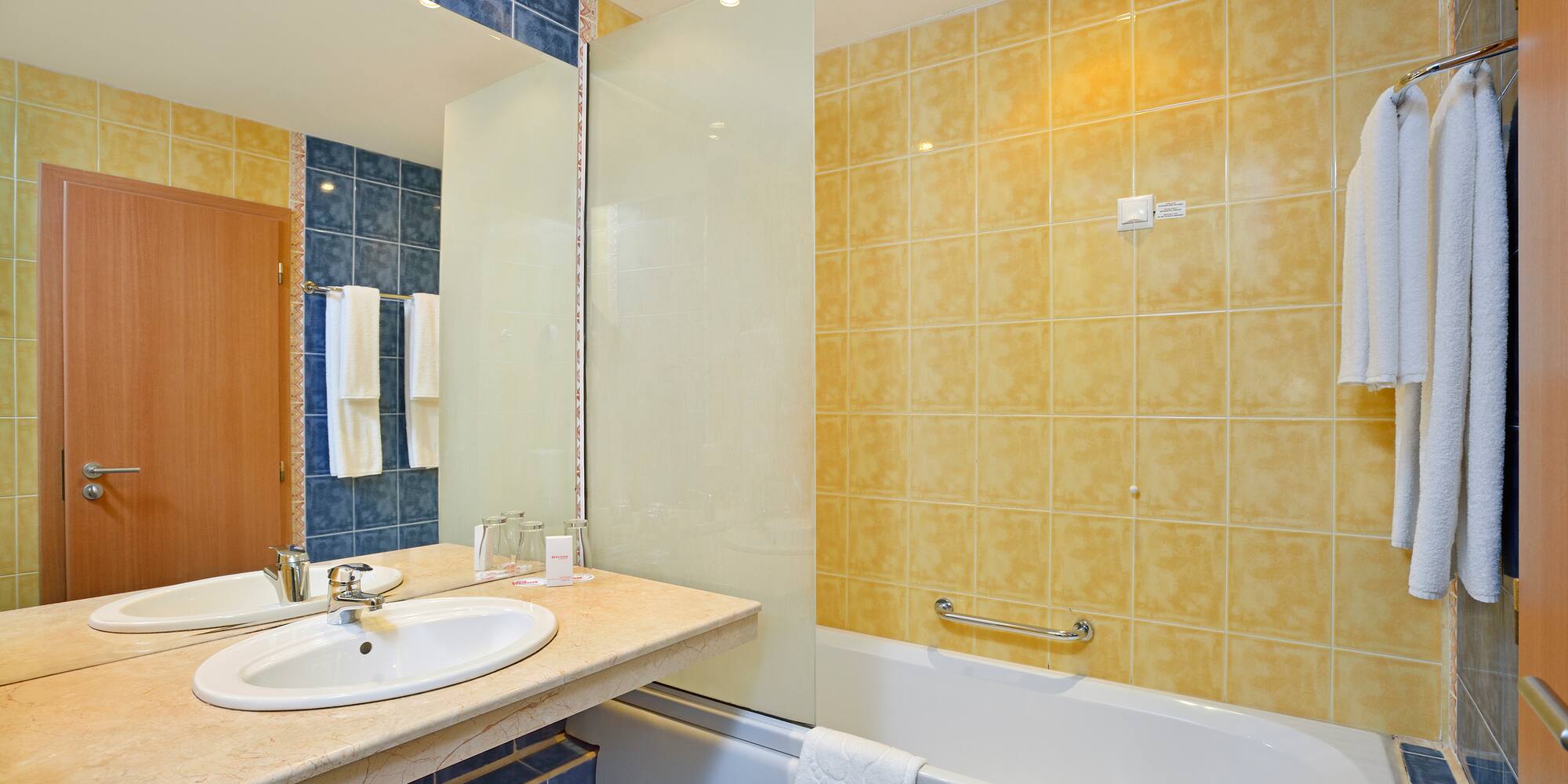 a bathroom with a sink and bathtub