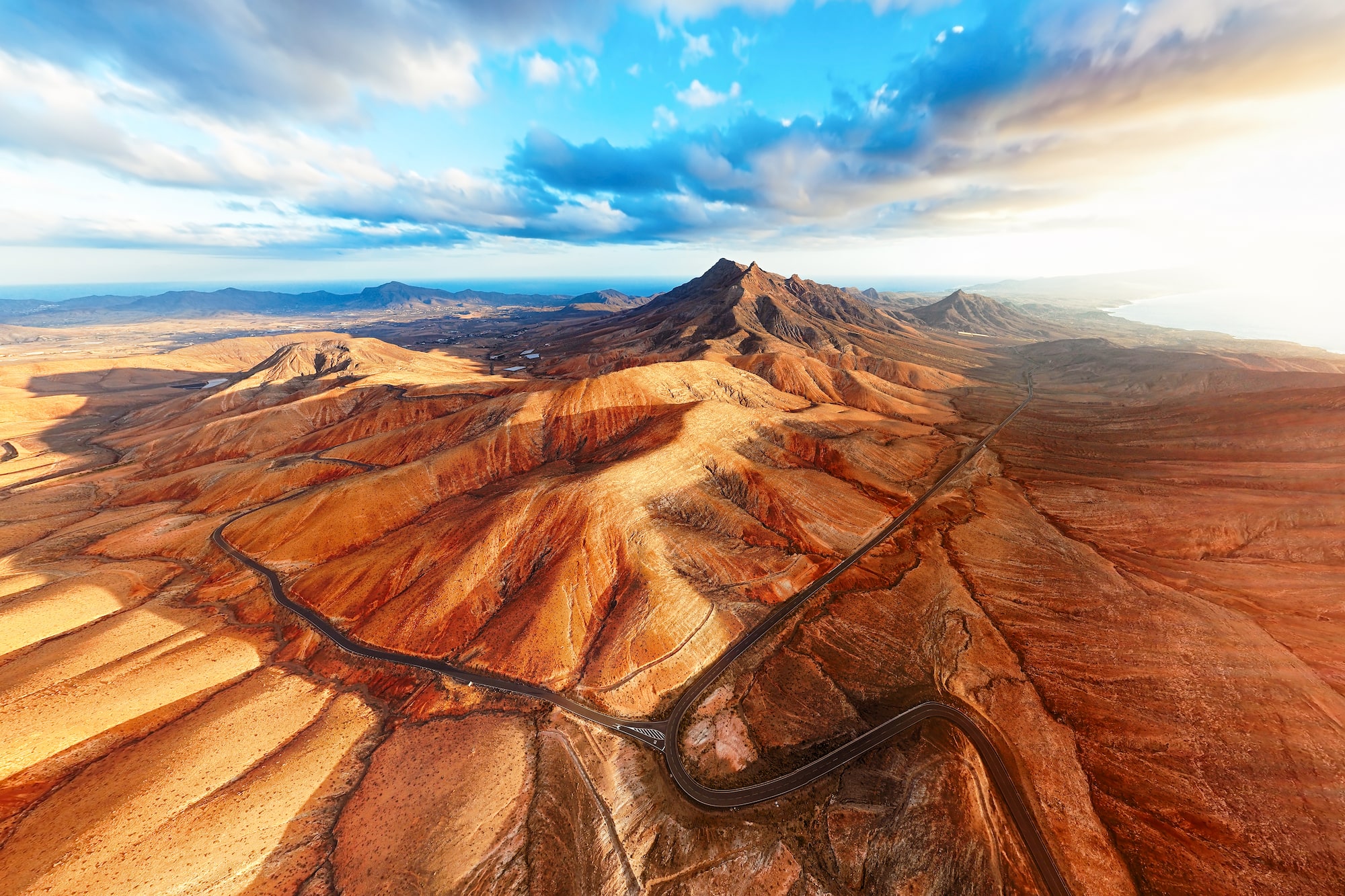 a road going through a desert landscape