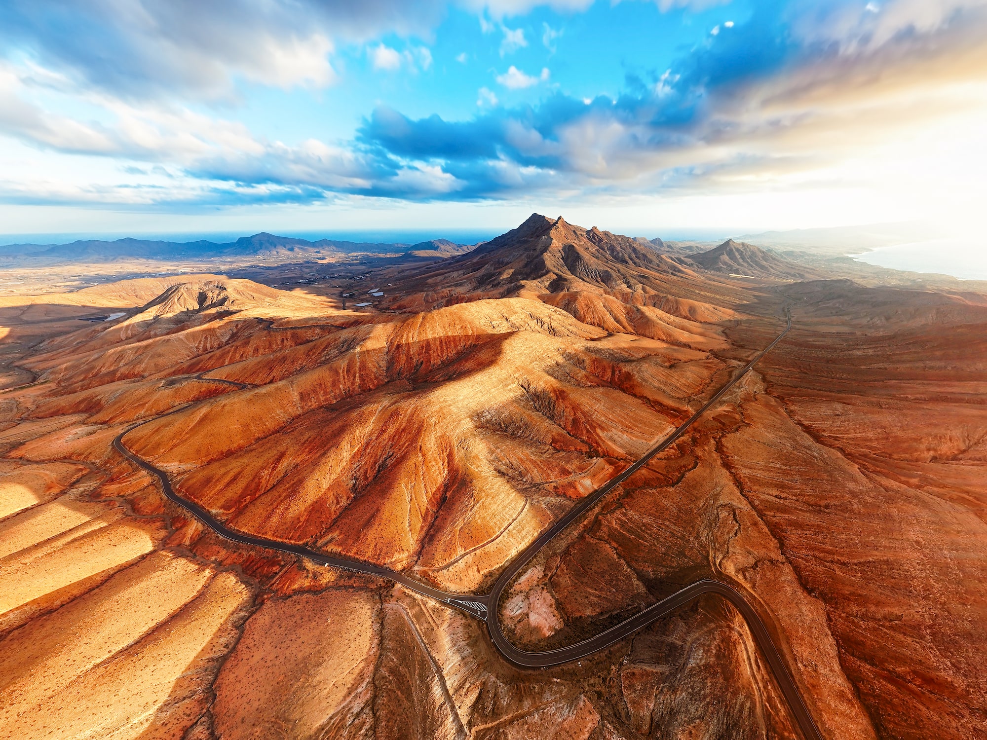 a road going through a desert landscape