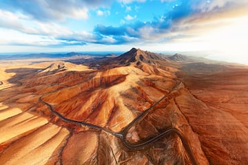 a road going through a desert landscape
