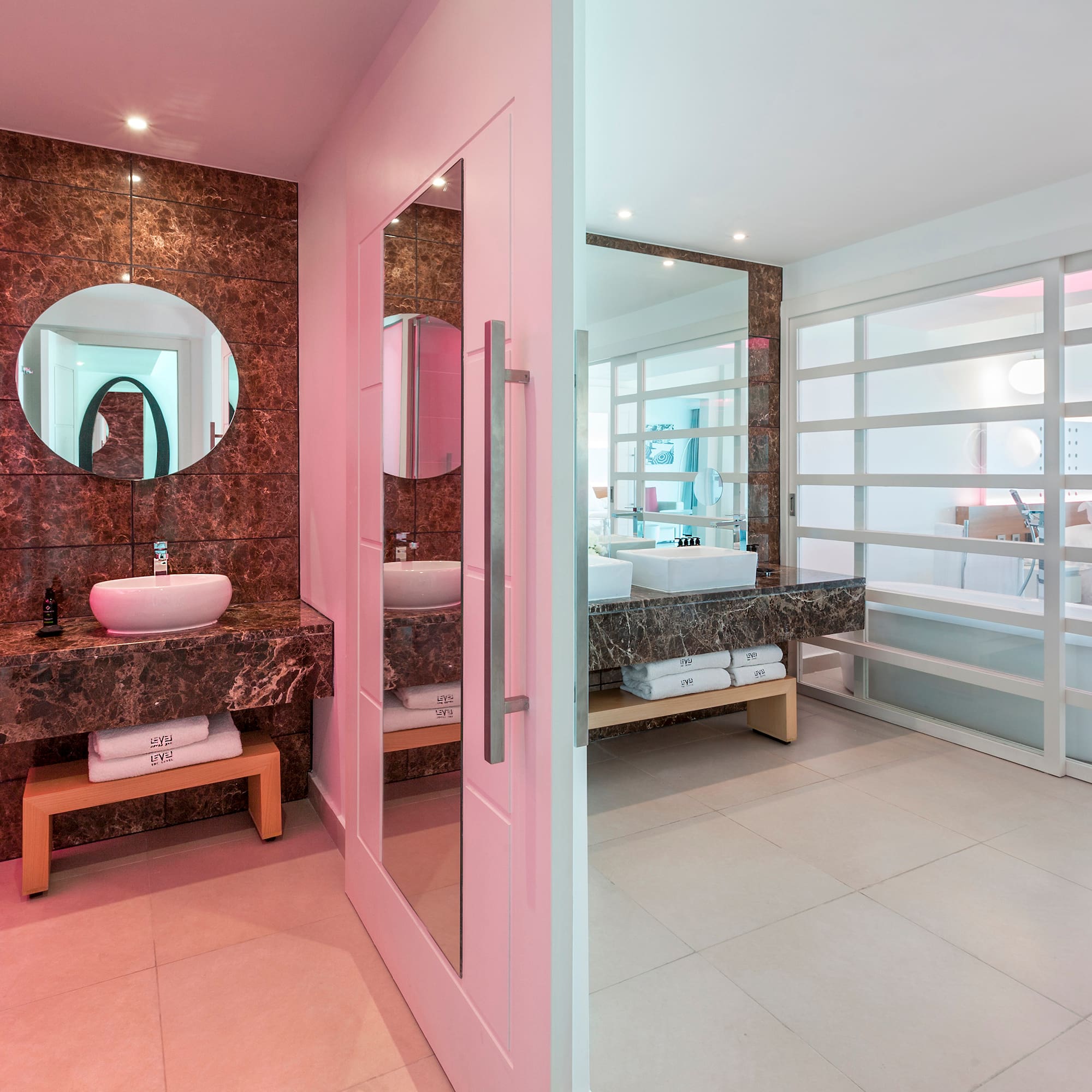 a bathroom with a mirror and sink