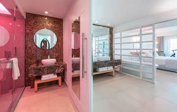 a bathroom with a mirror and sink