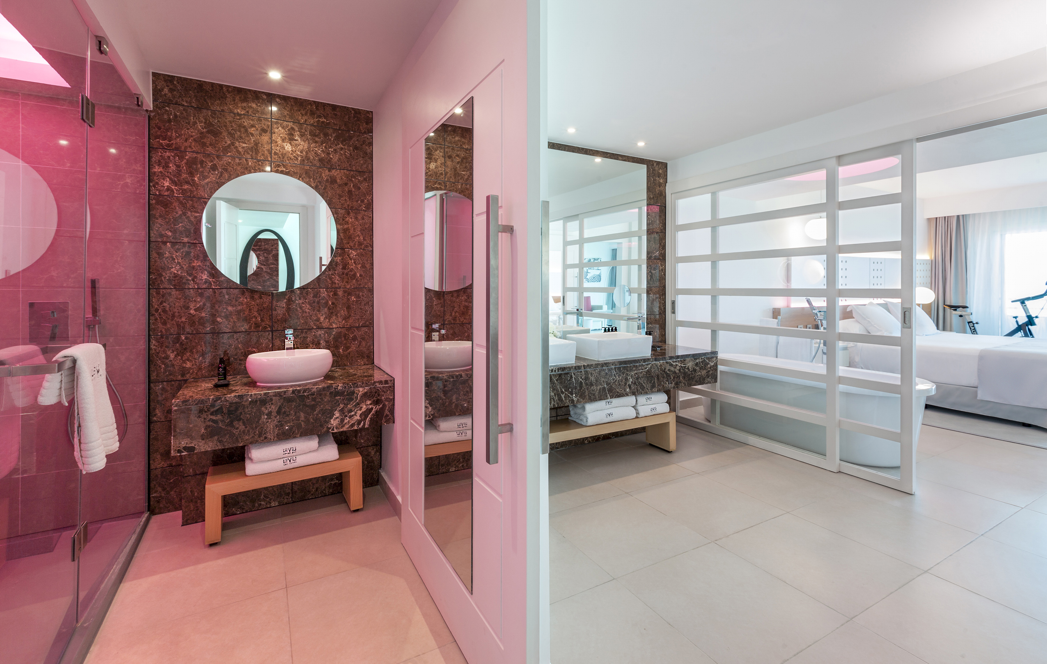 a bathroom with a mirror and sink