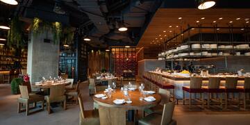 a restaurant with tables and chairs