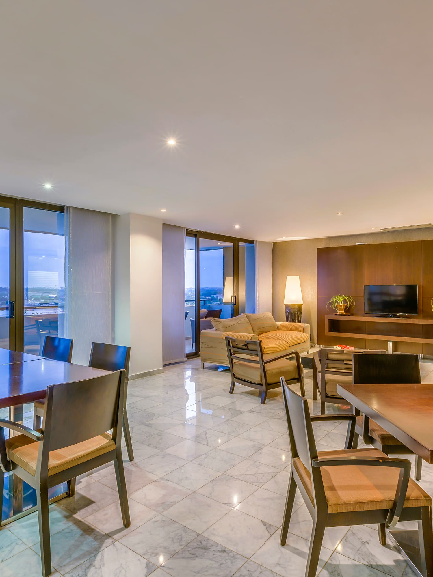 a room with a table and chairs