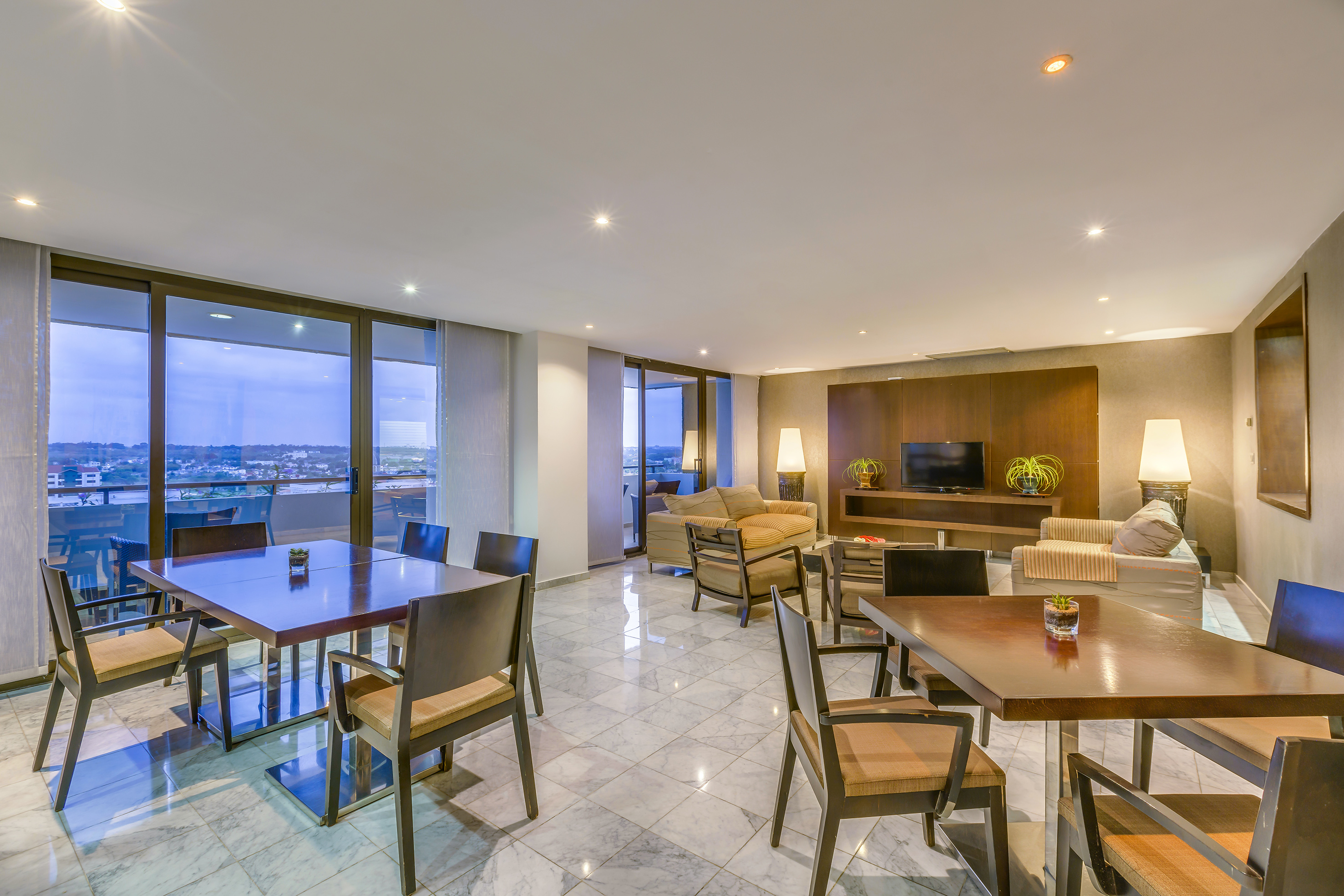 a room with a table and chairs