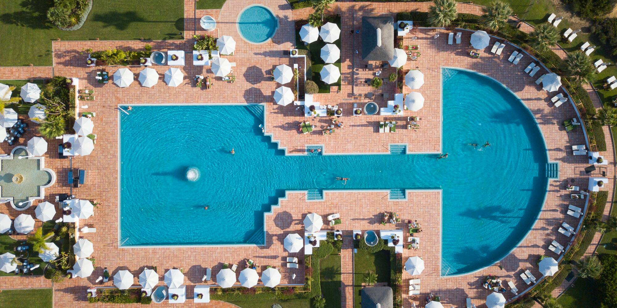 an aerial view of a pool