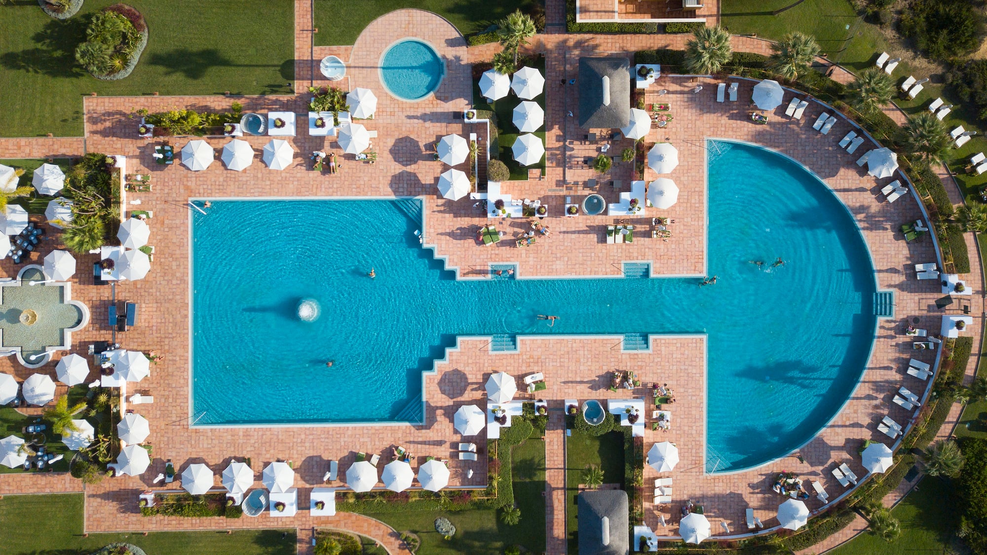 an aerial view of a pool