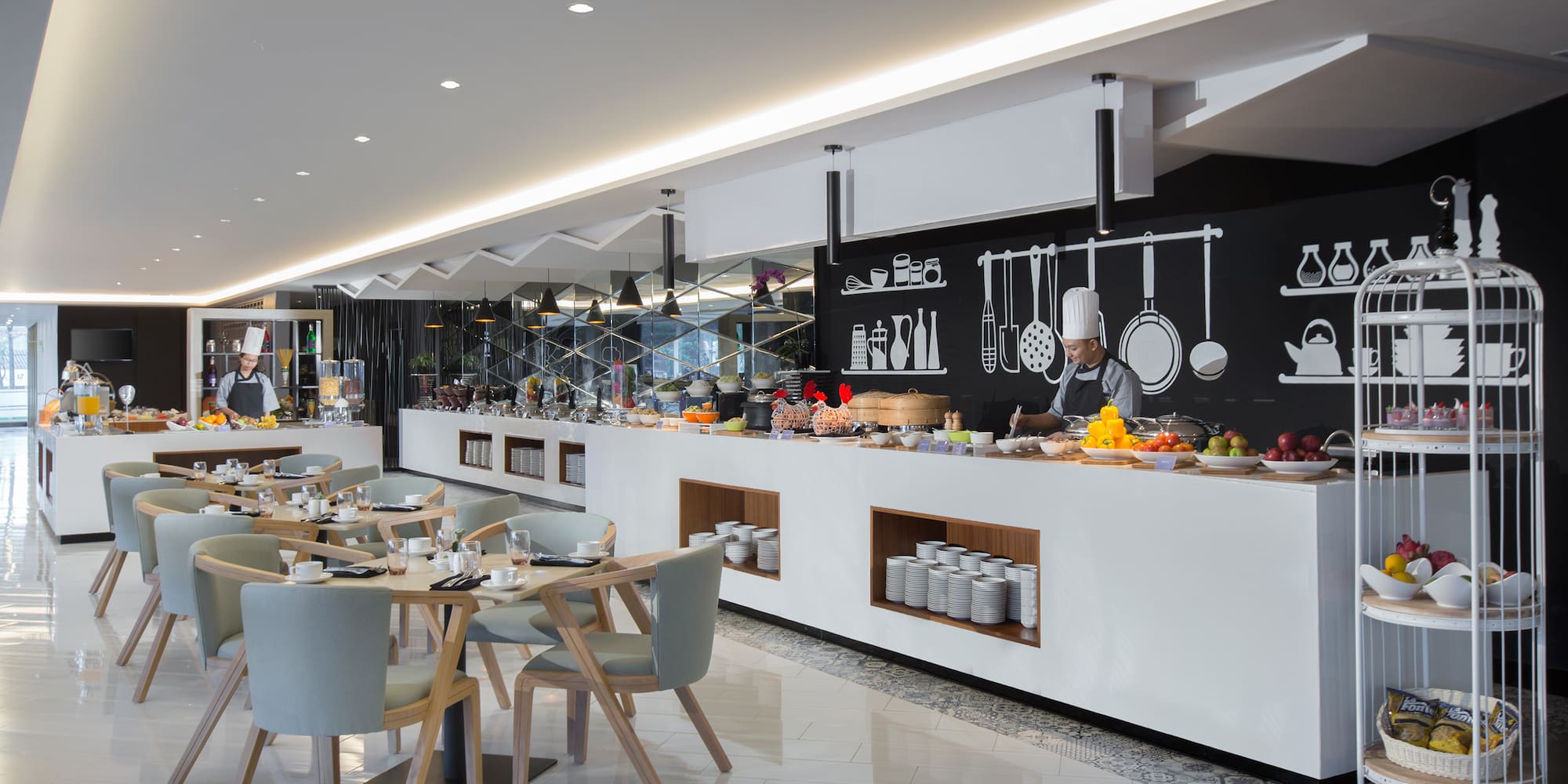 a restaurant with a chef in the background