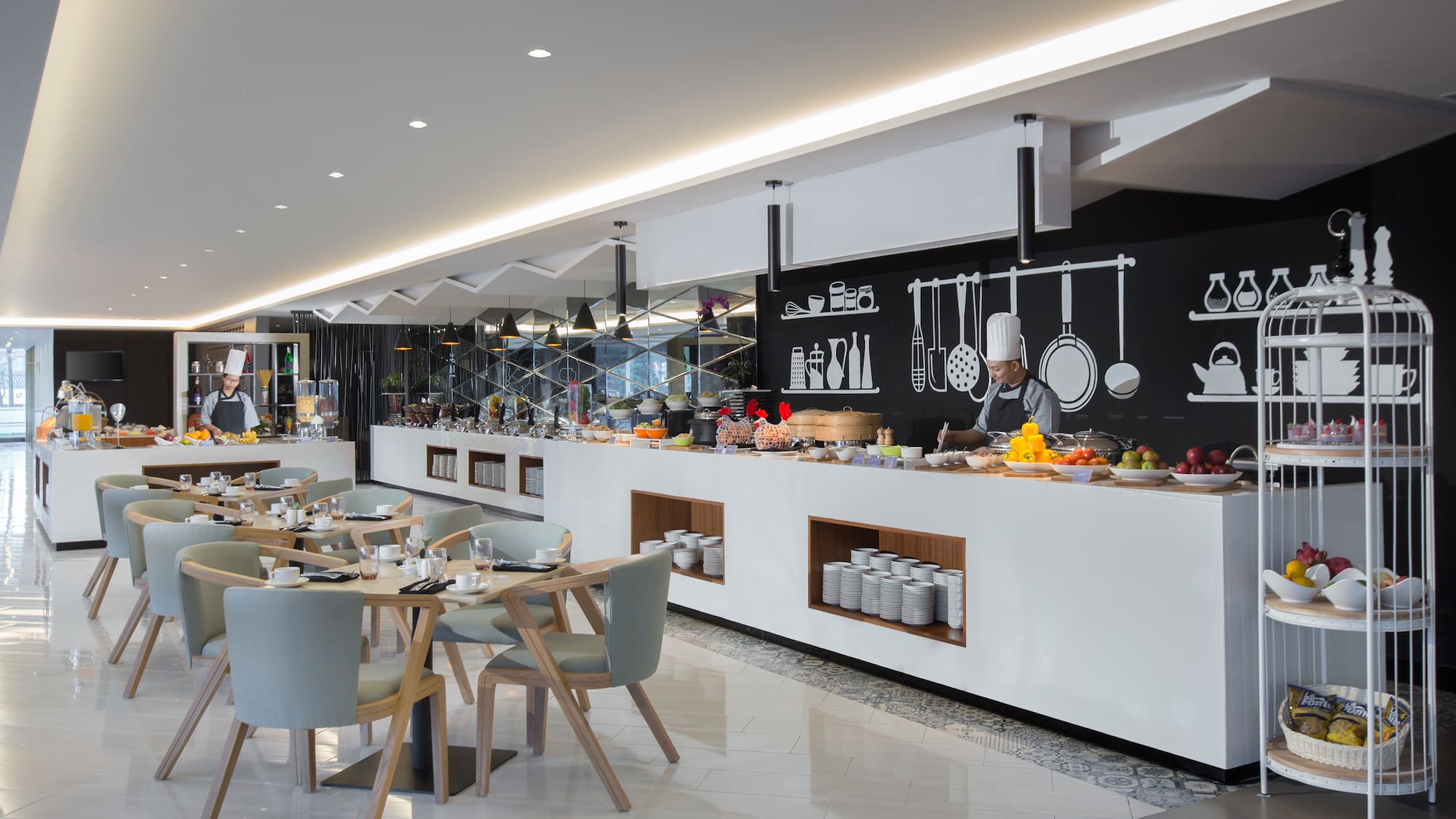 a restaurant with a chef in the background