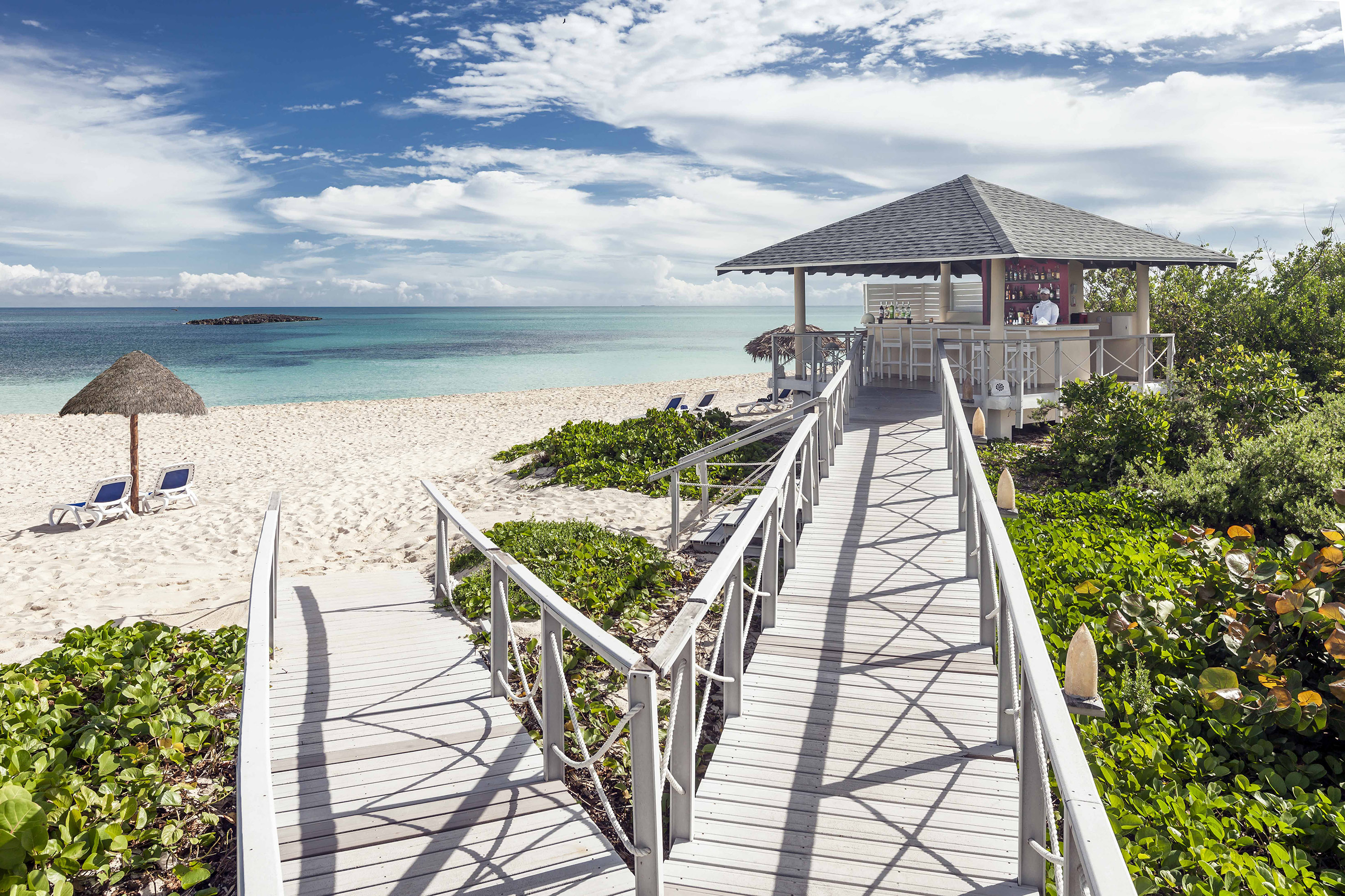 a walkway leading to a beach