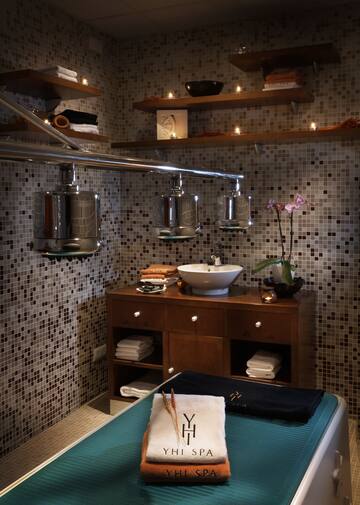a bathroom with a sink and shelves