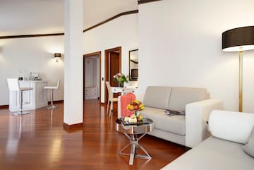 a living room with a couch and a table