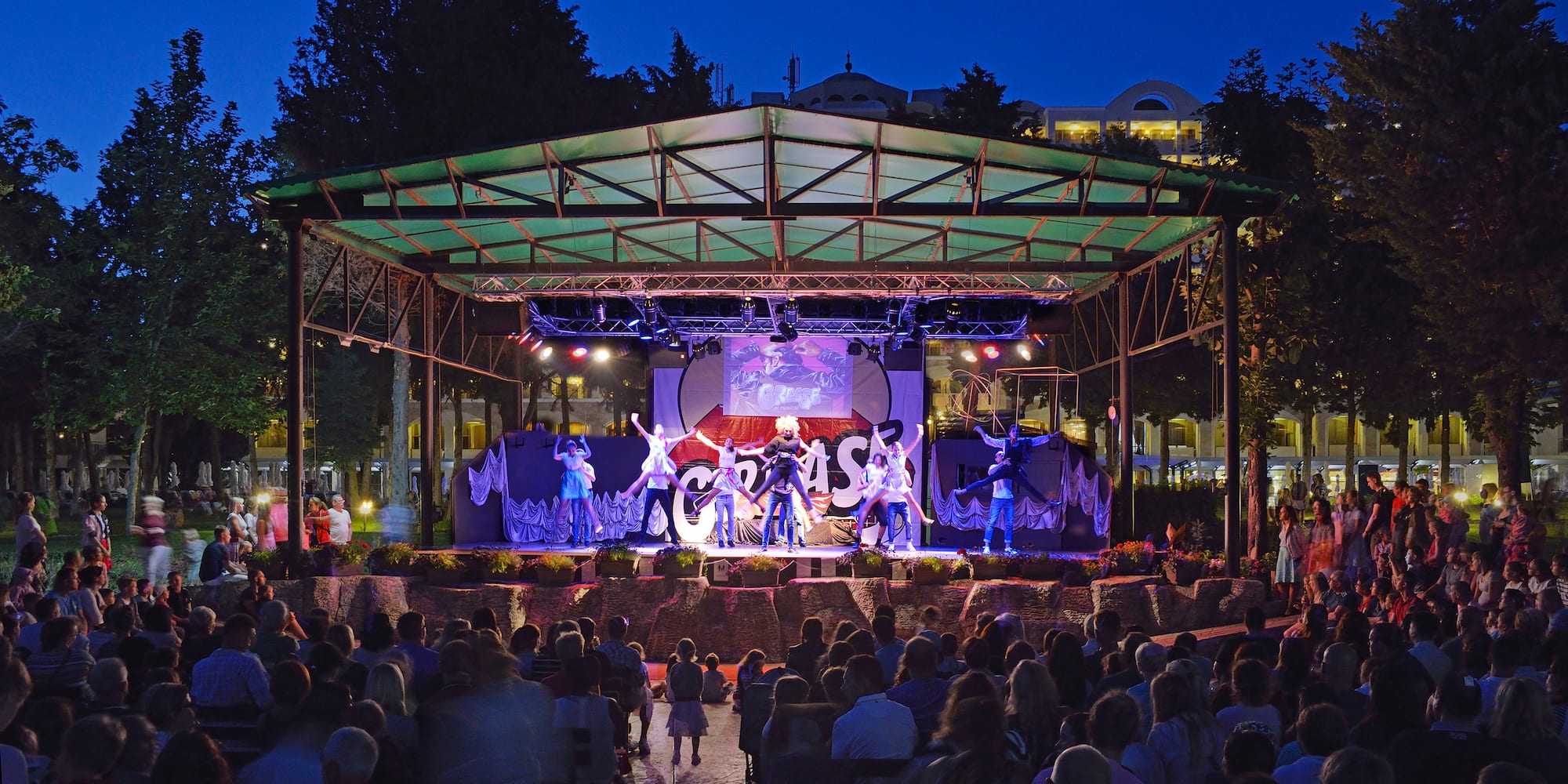 a stage with people watching