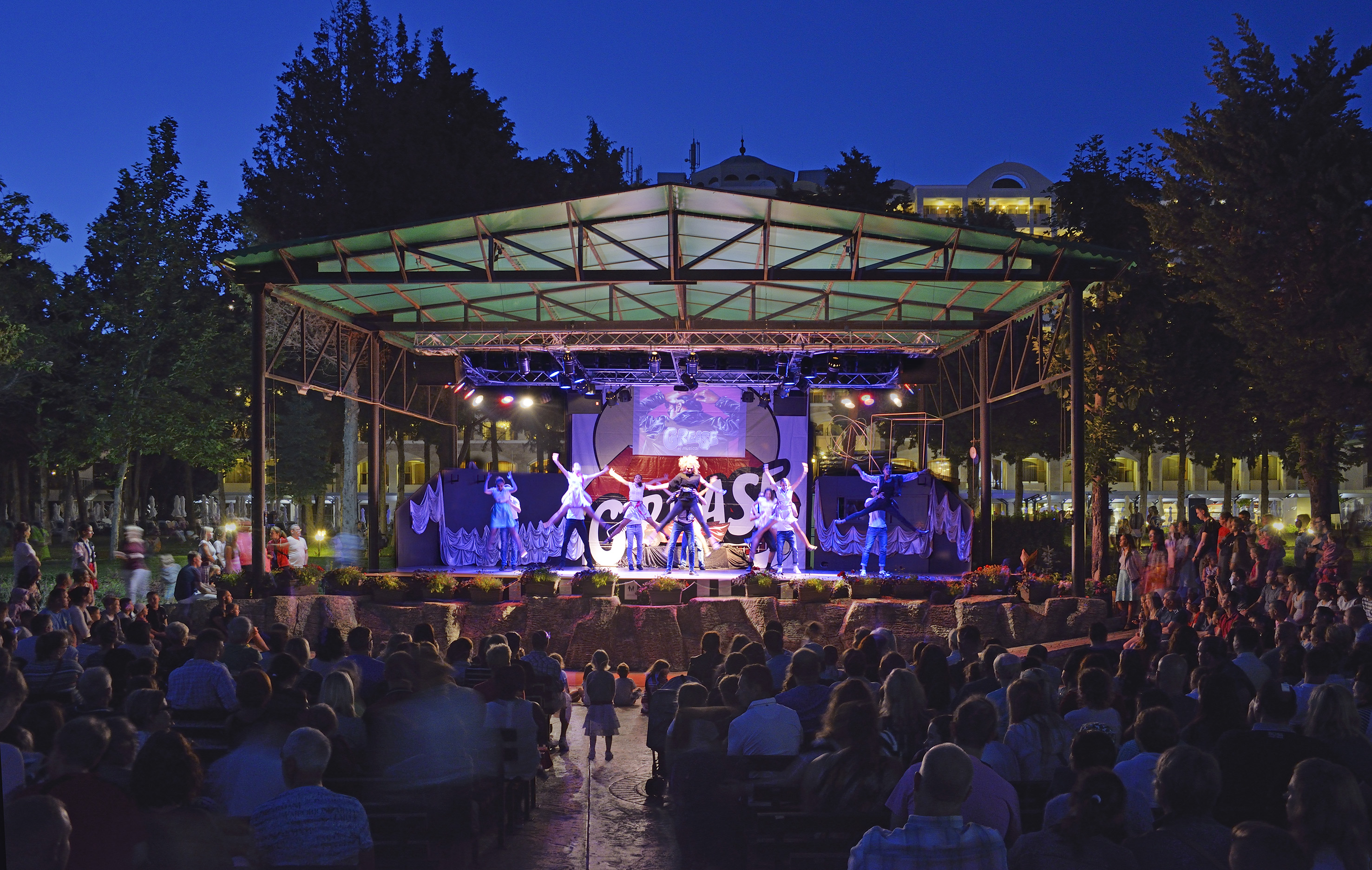 a stage with people watching