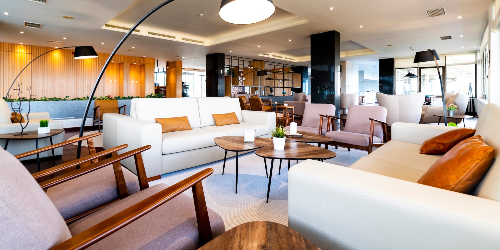 a room with couches and chairs