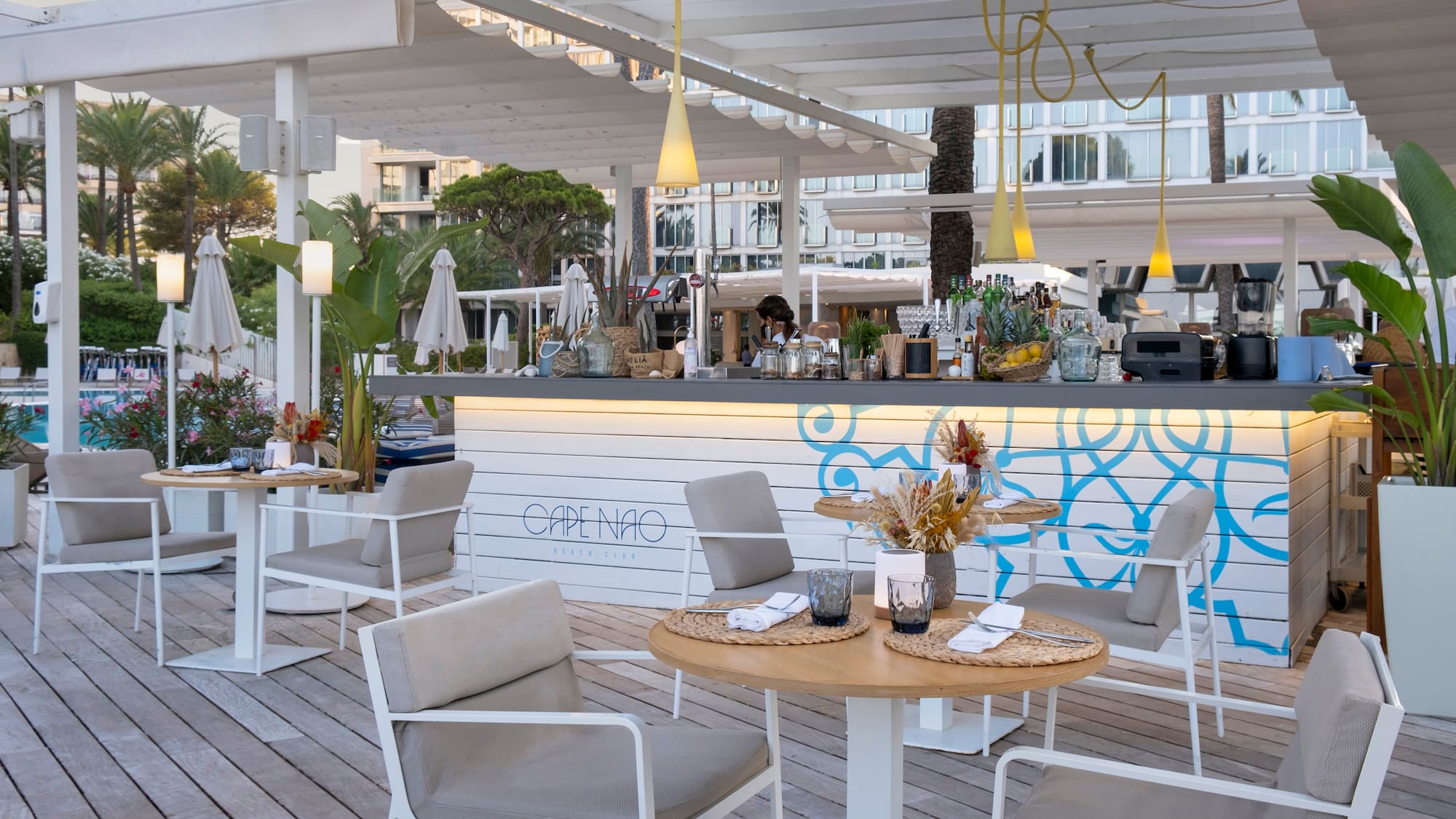 a restaurant with tables and chairs