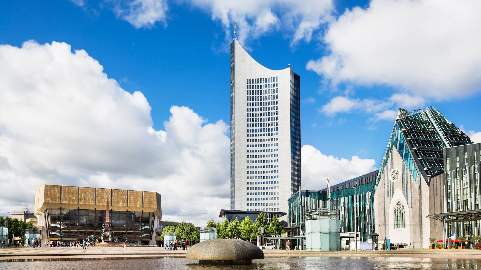 a building next to a body of water
