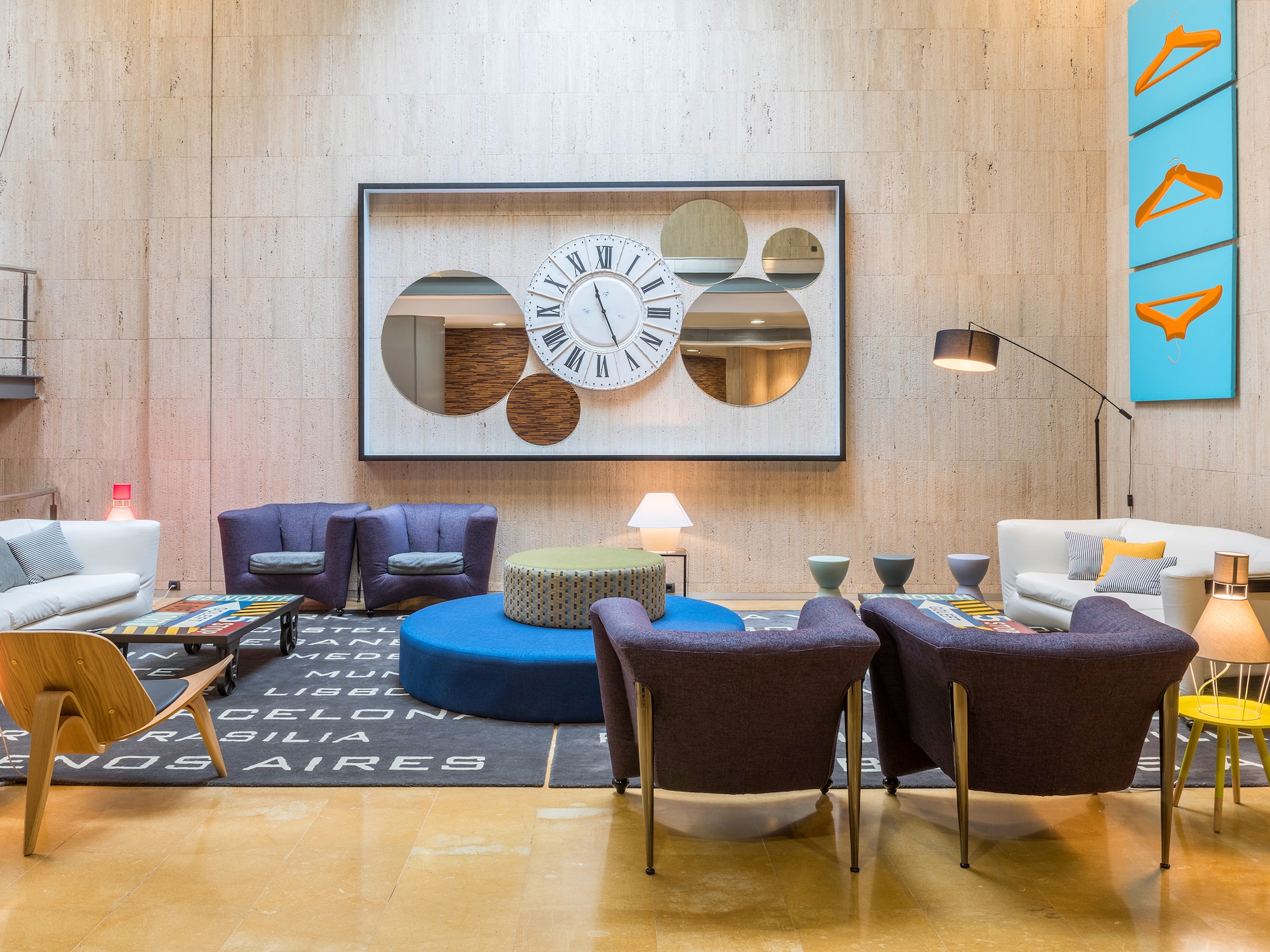 a room with a large mirror and a couch