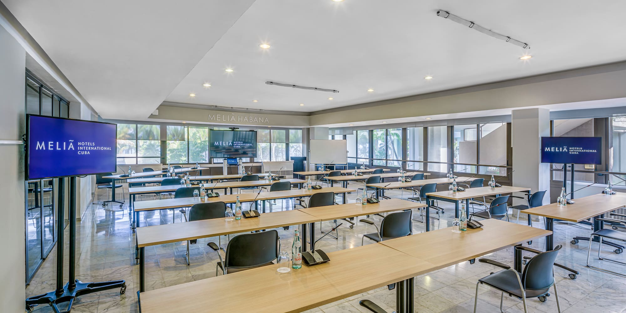 a room with tables and chairs
