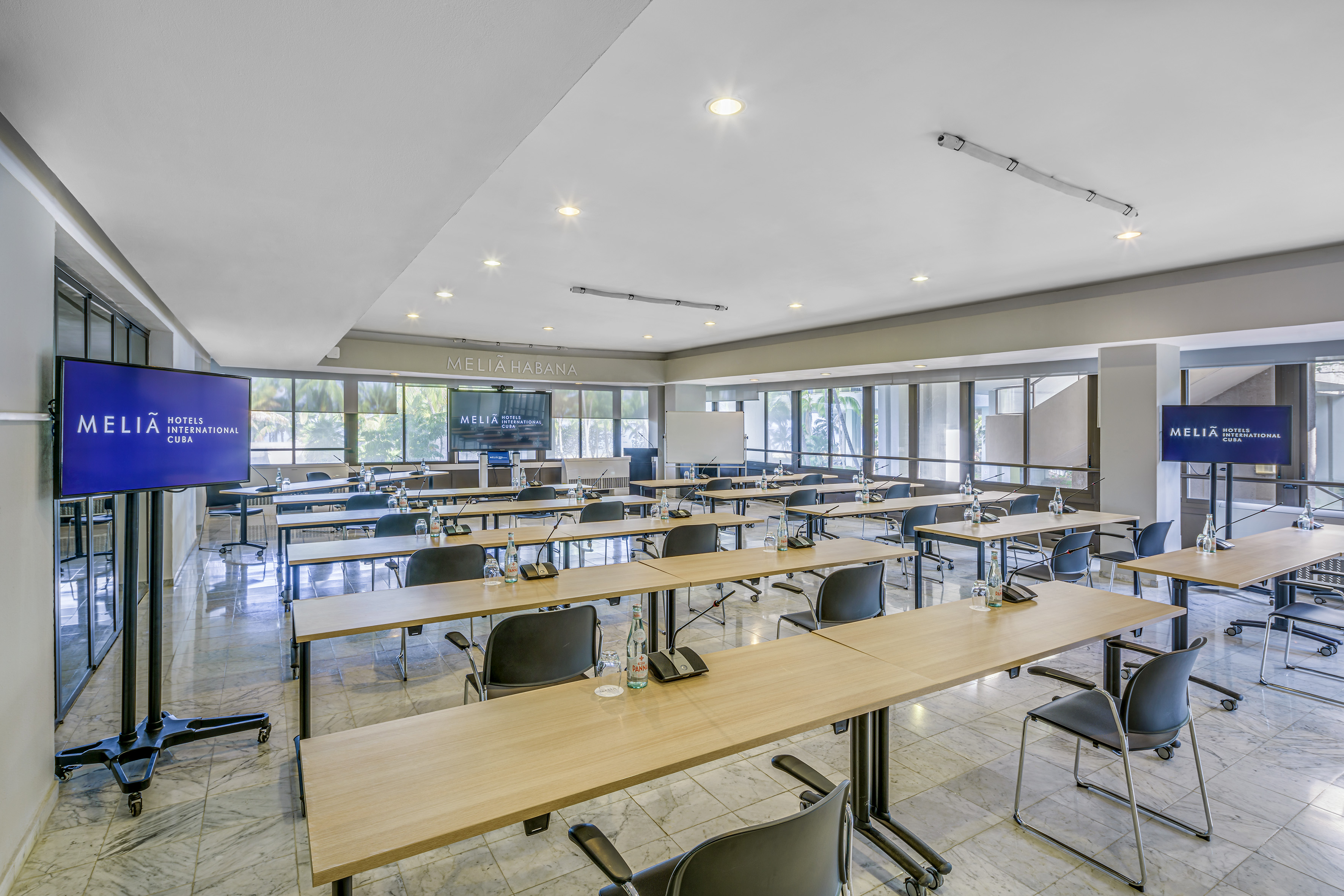 a room with tables and chairs
