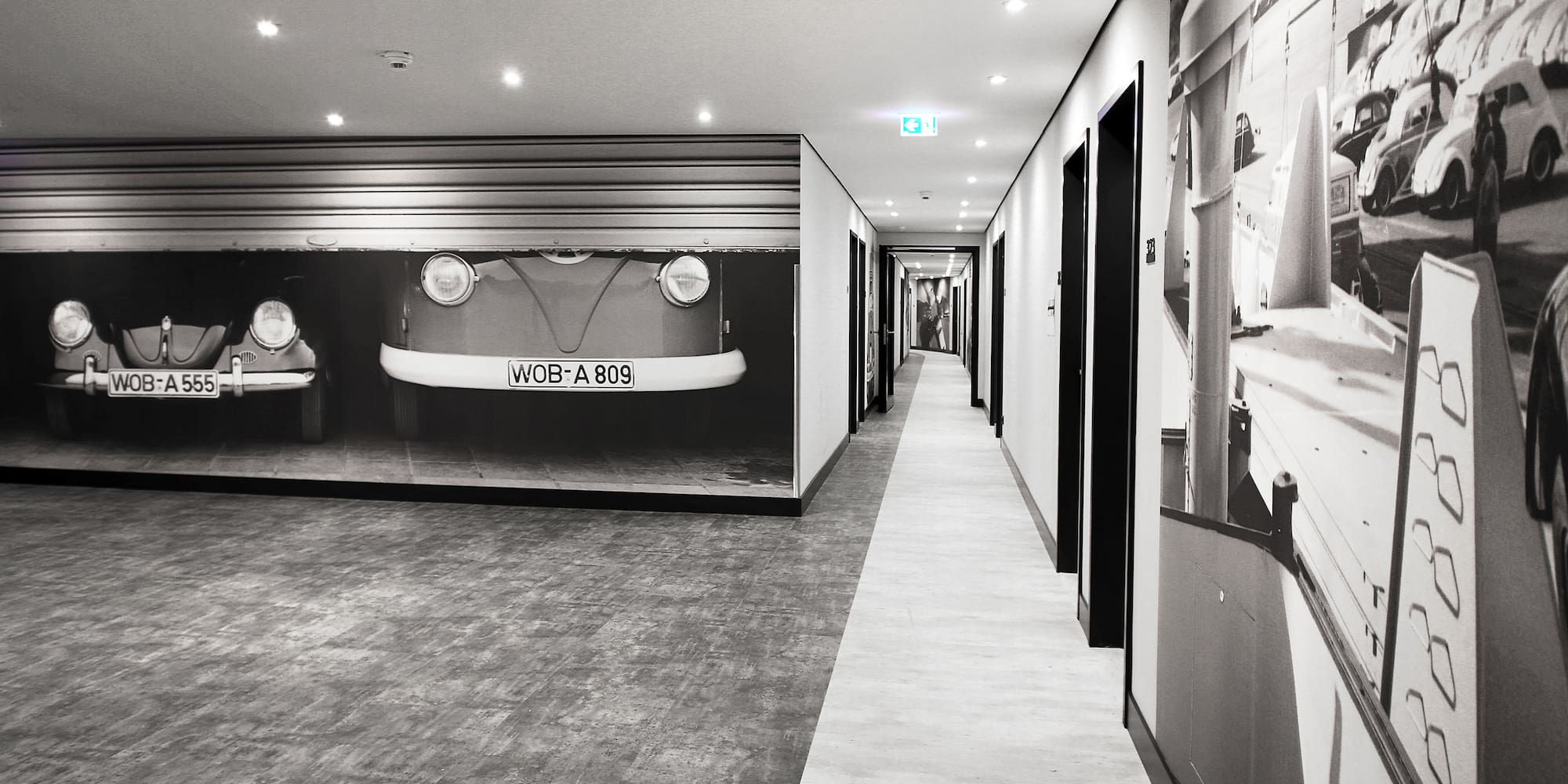 a hallway with pictures on the wall