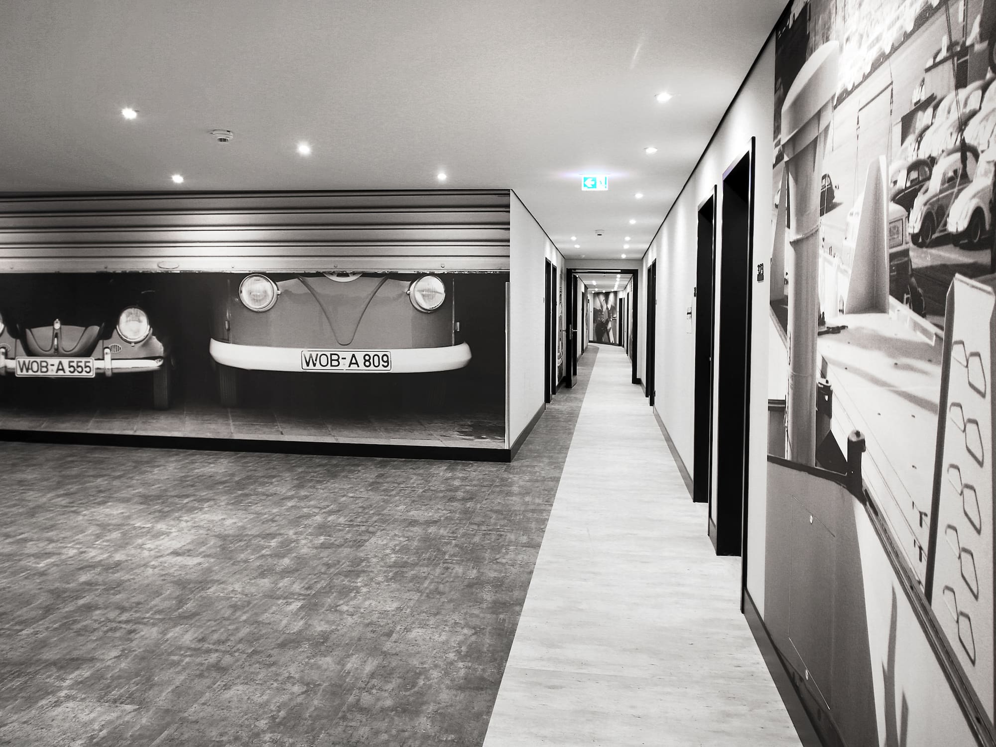 a hallway with pictures on the wall