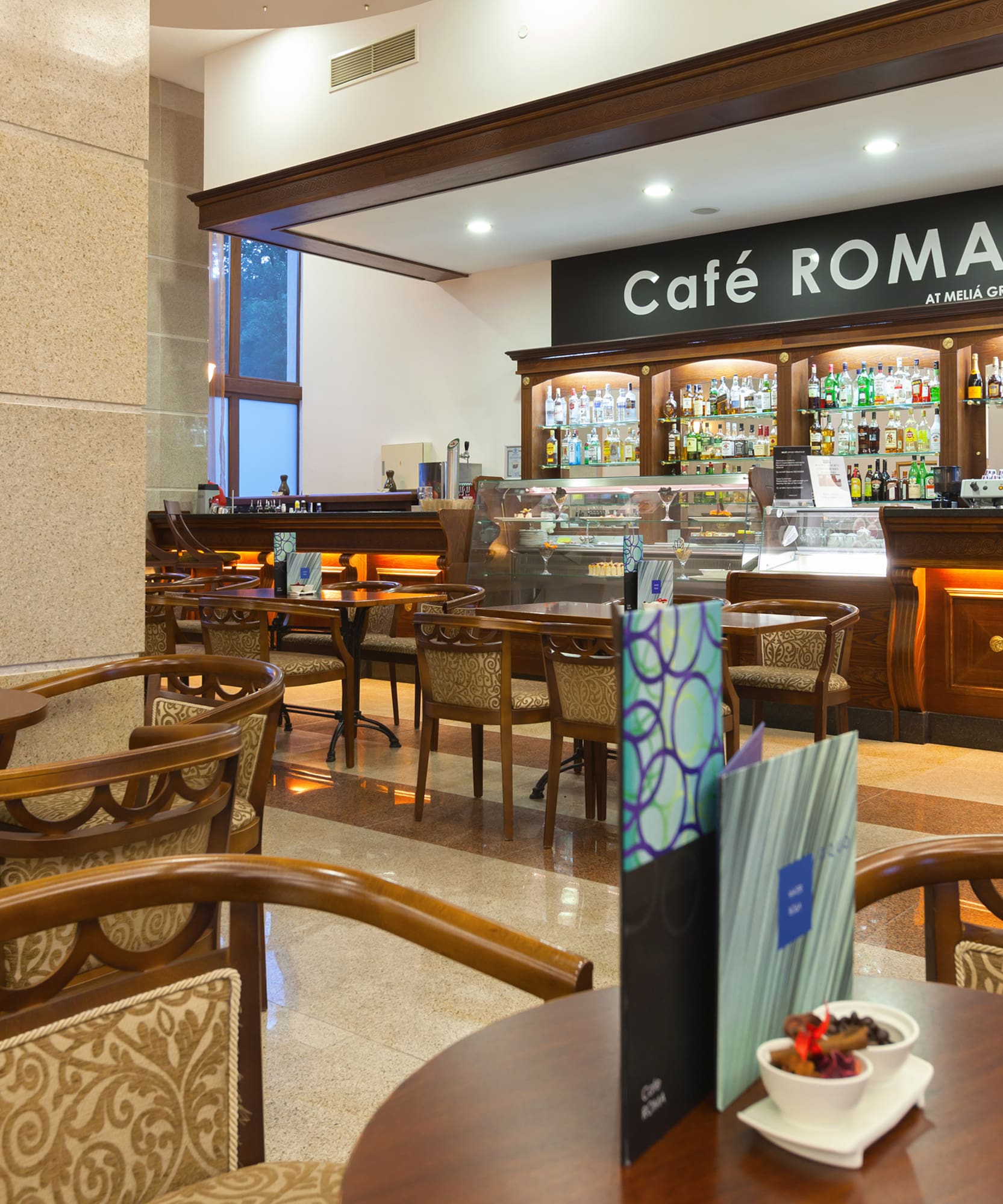 a restaurant with tables and chairs