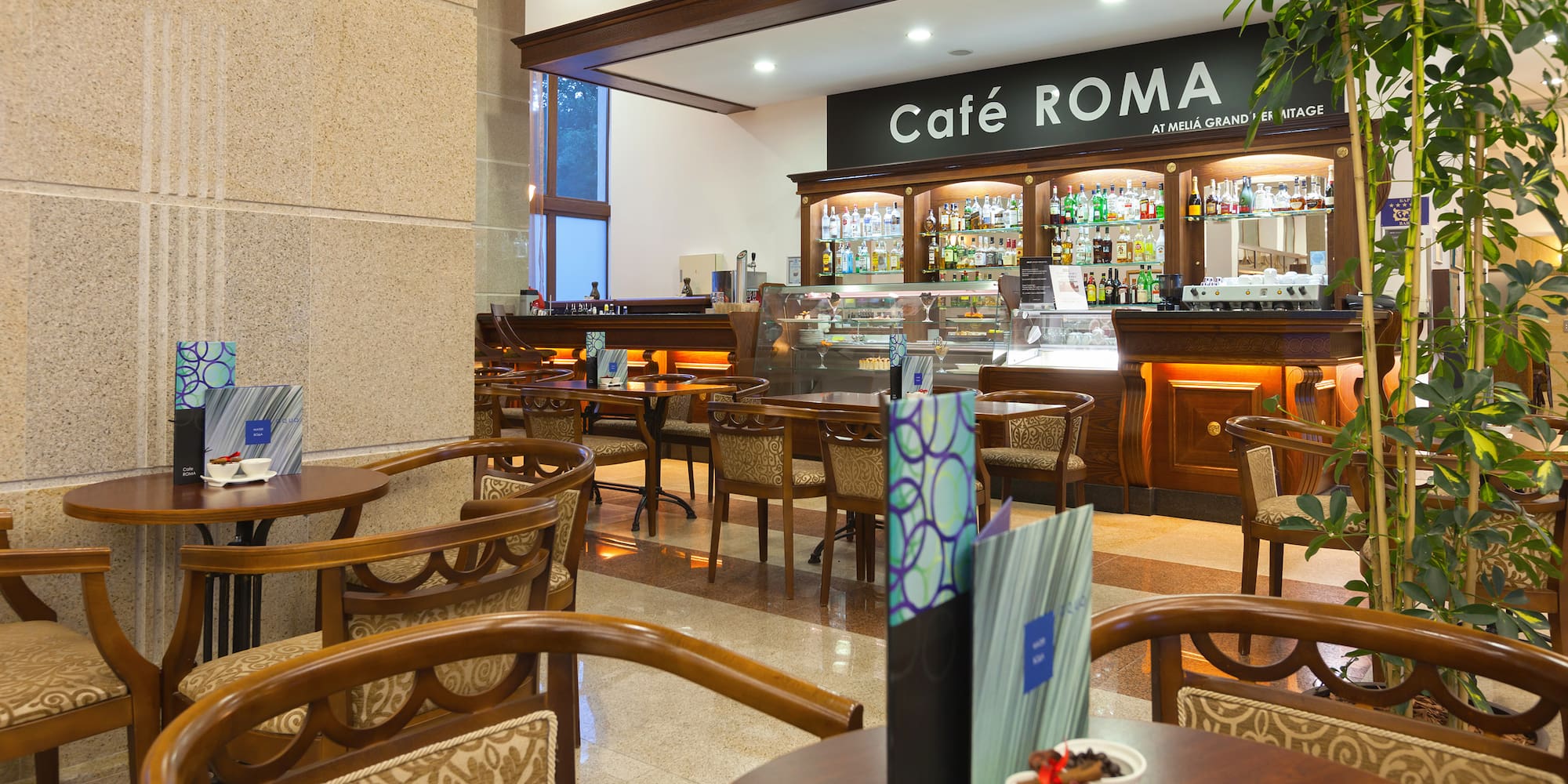 a restaurant with tables and chairs