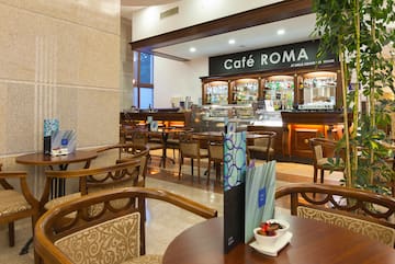 a restaurant with tables and chairs