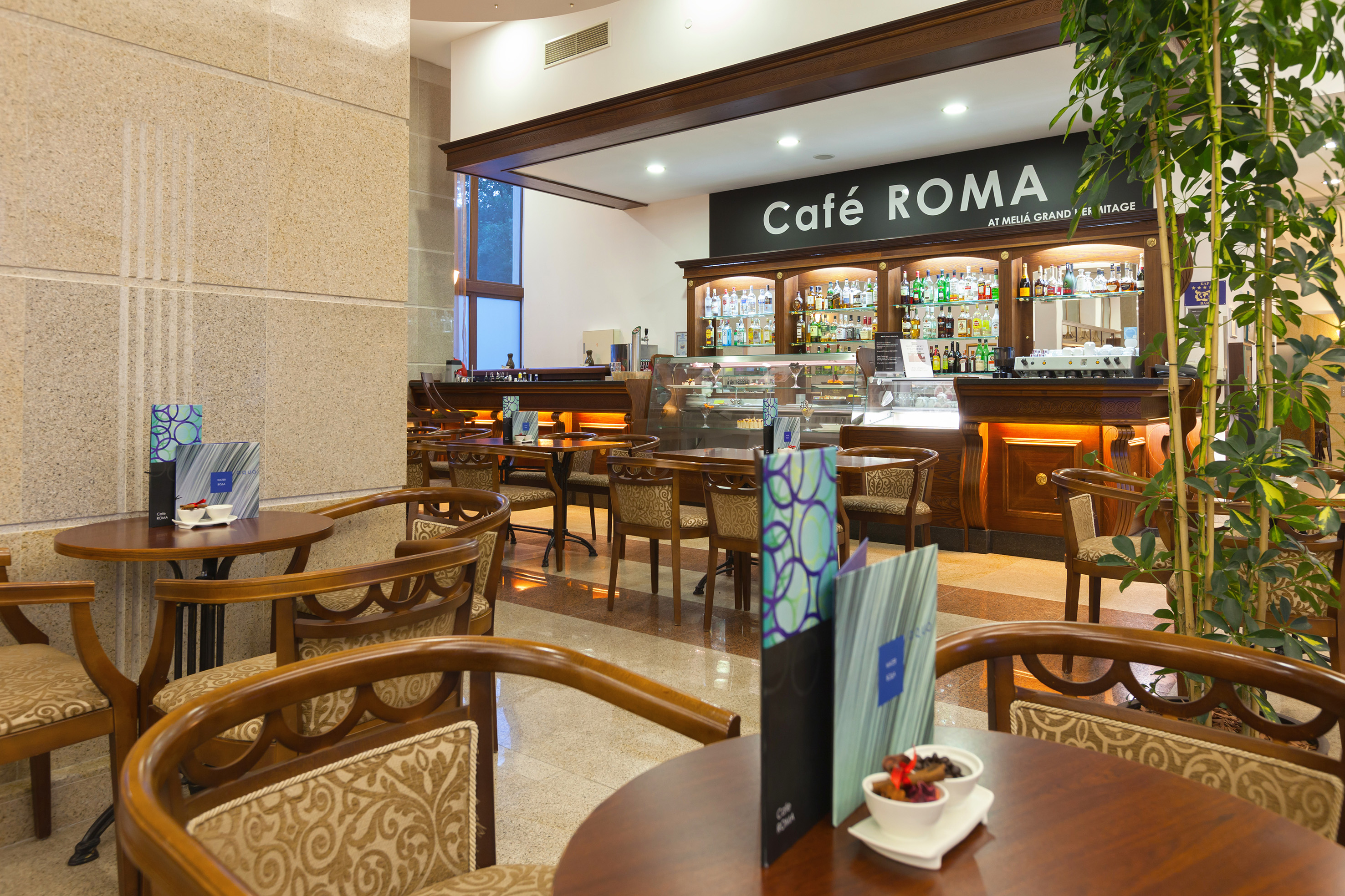 a restaurant with tables and chairs