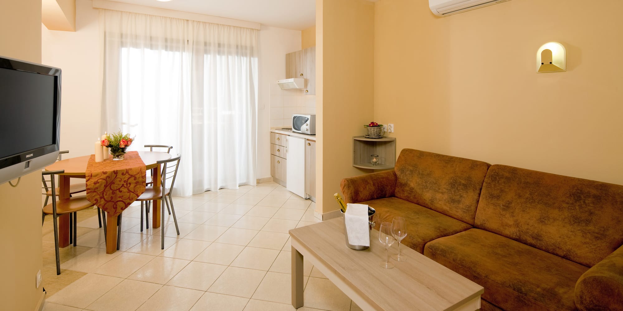 a living room with a couch and table