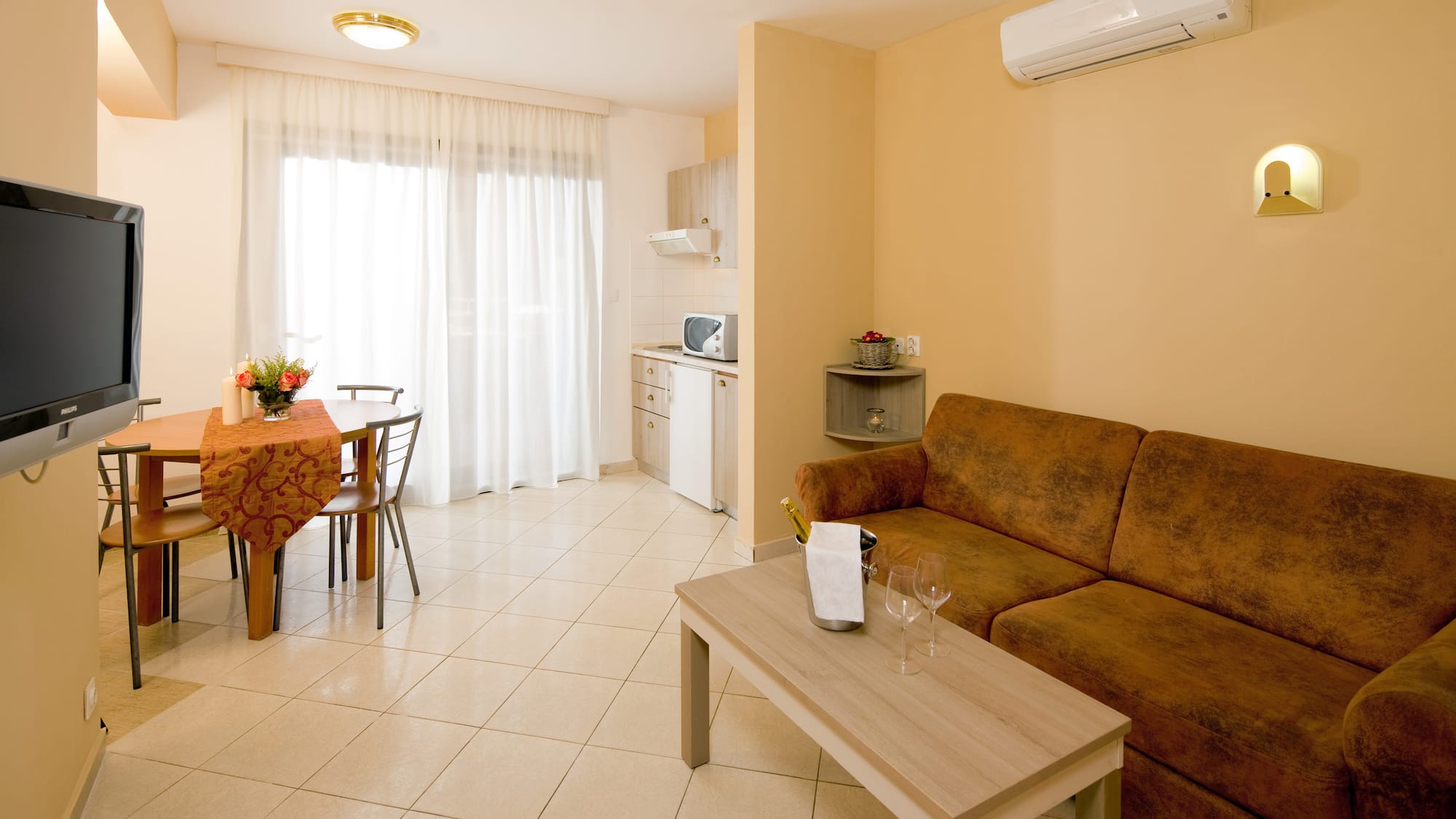 a living room with a couch and table